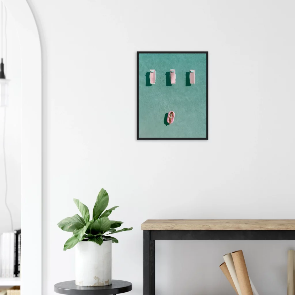 Aerial infinity pool and sunbeds — Framed Print room view | Atelier Marbella