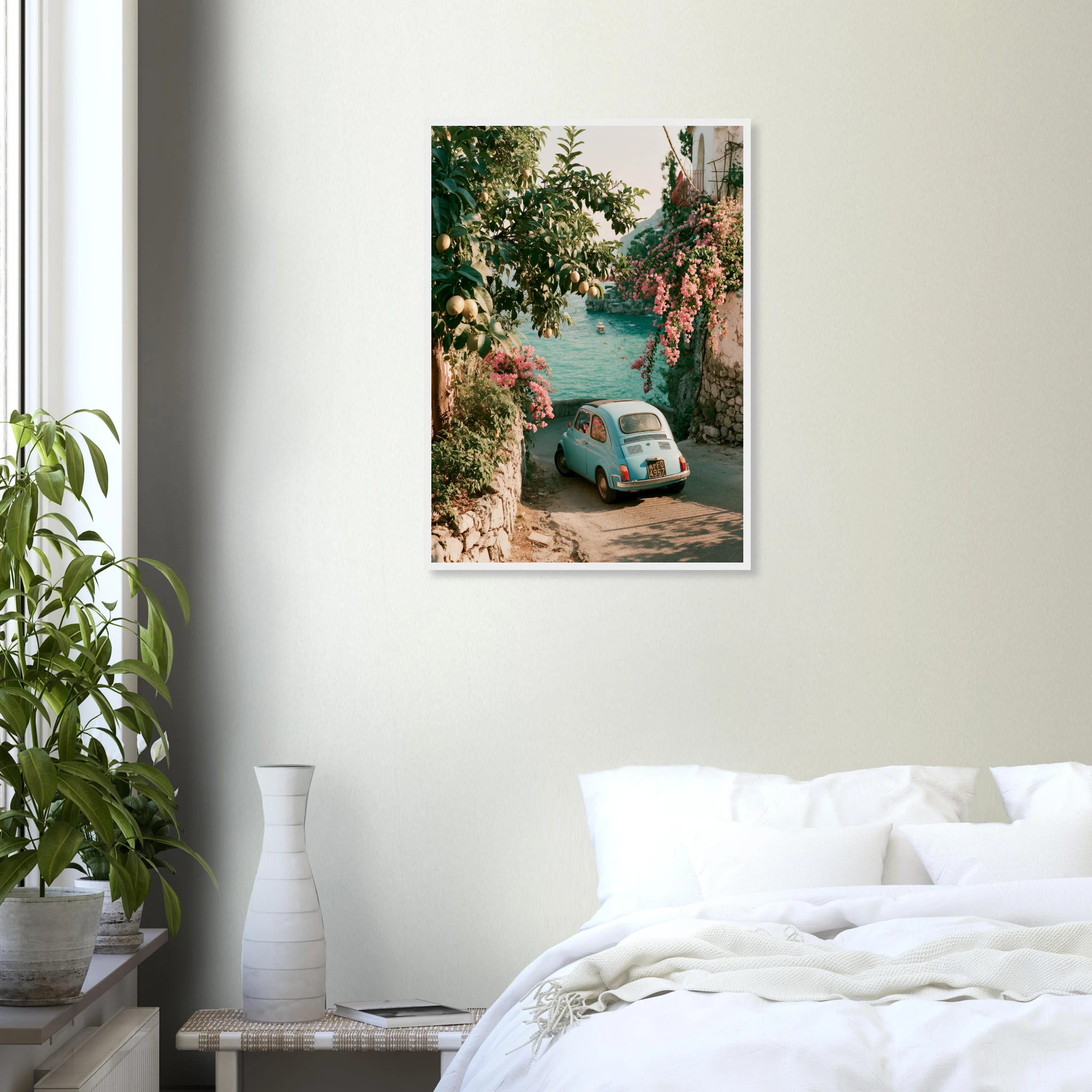 Fiat 500 Amalfi framed print in a light frame on a calm bedroom wall